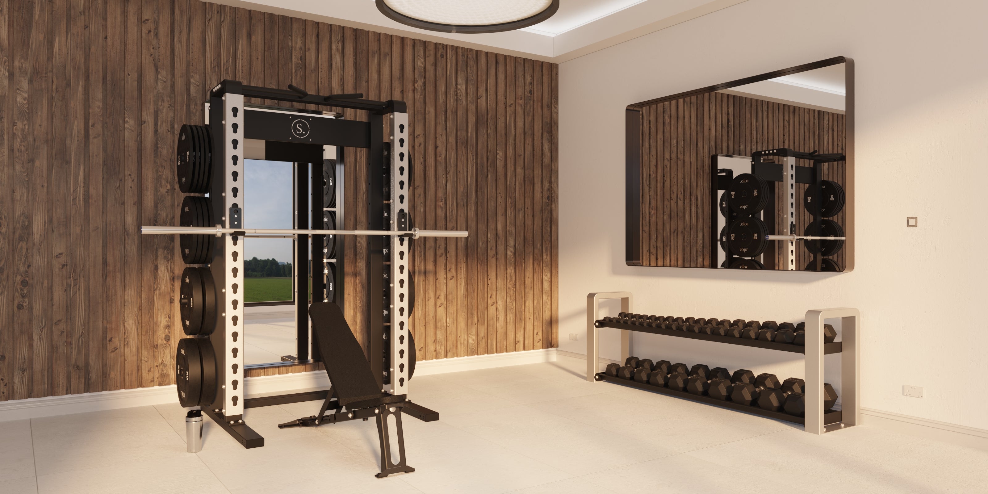 gym with squat rack dumbbell storage and mirrors