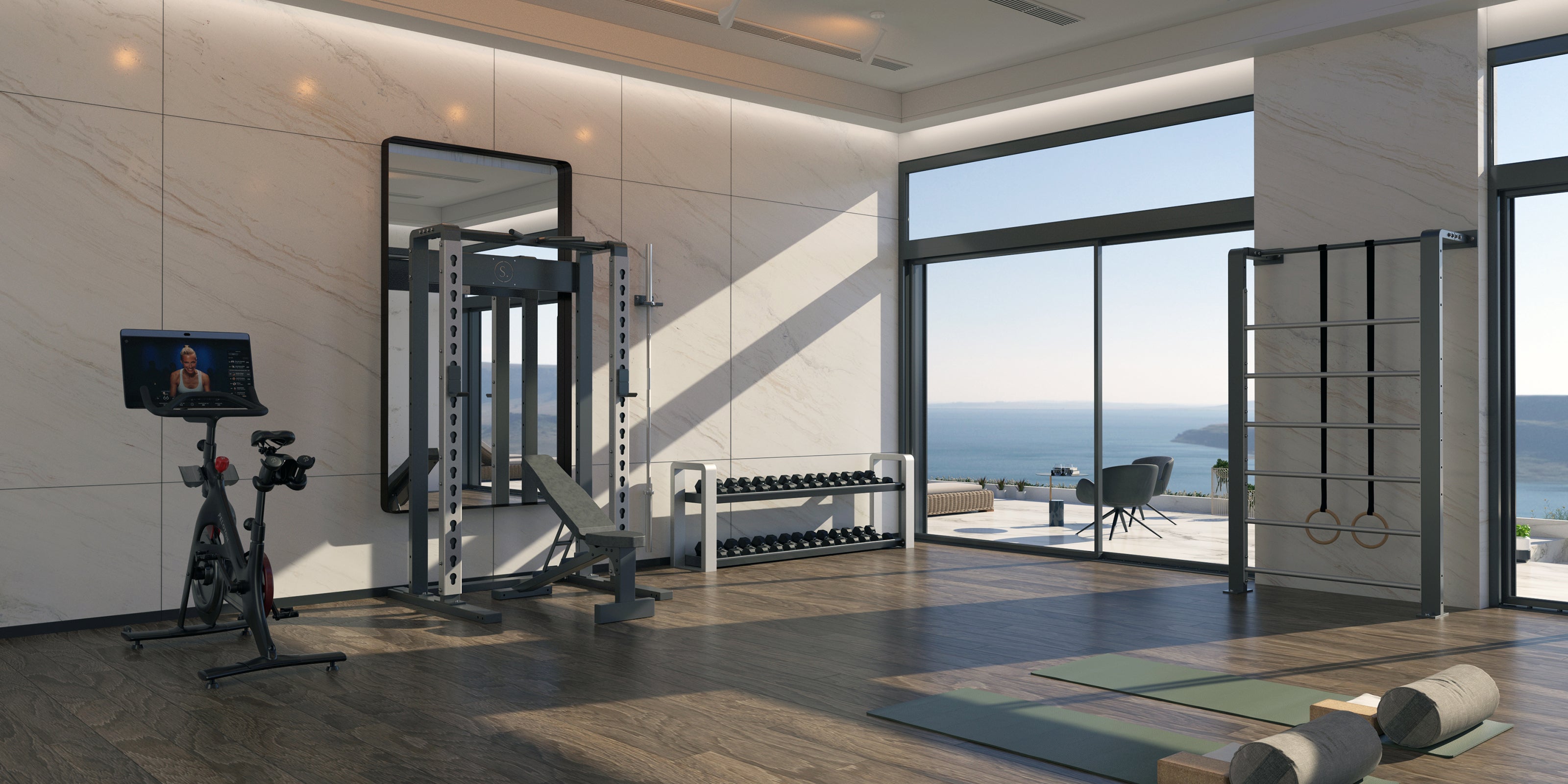 beachfront home gym space with equipment and wooden floor